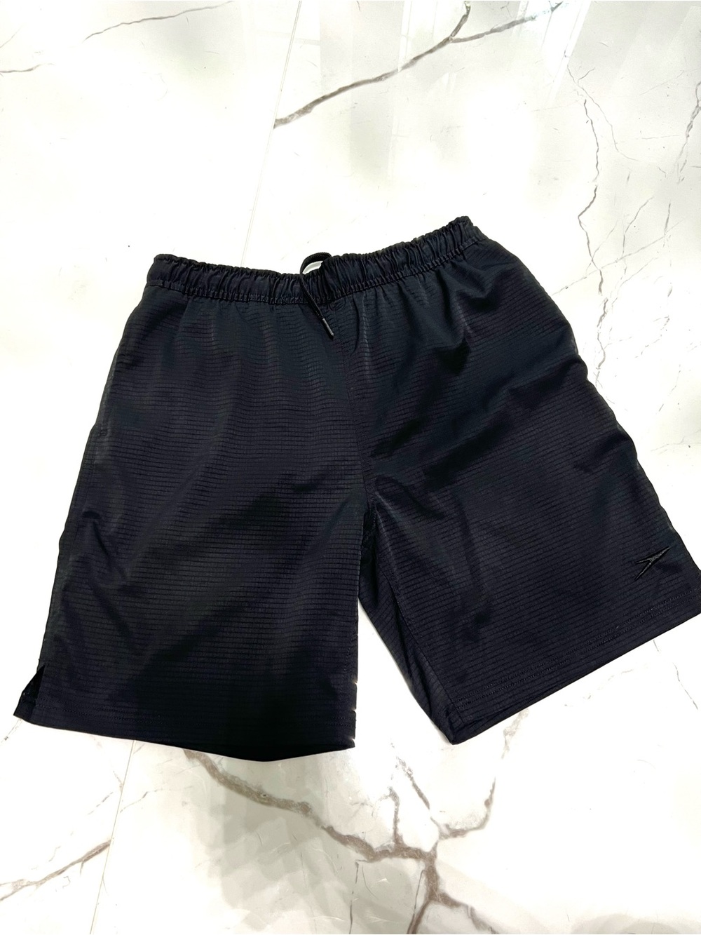 Speedo black athletic shorts, size S.